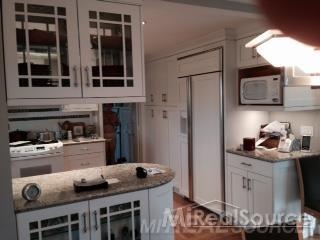 1975 East Leonard Road Leonard, MI 48367 - Photo 11 of 27 31233394-10.JPG