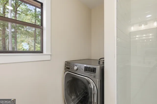 a view of a house with wooden deck