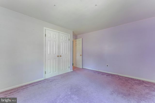 a view of a house with a swimming pool