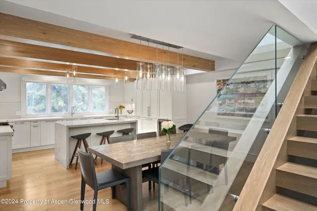 a view of an outdoor dining space with furniture