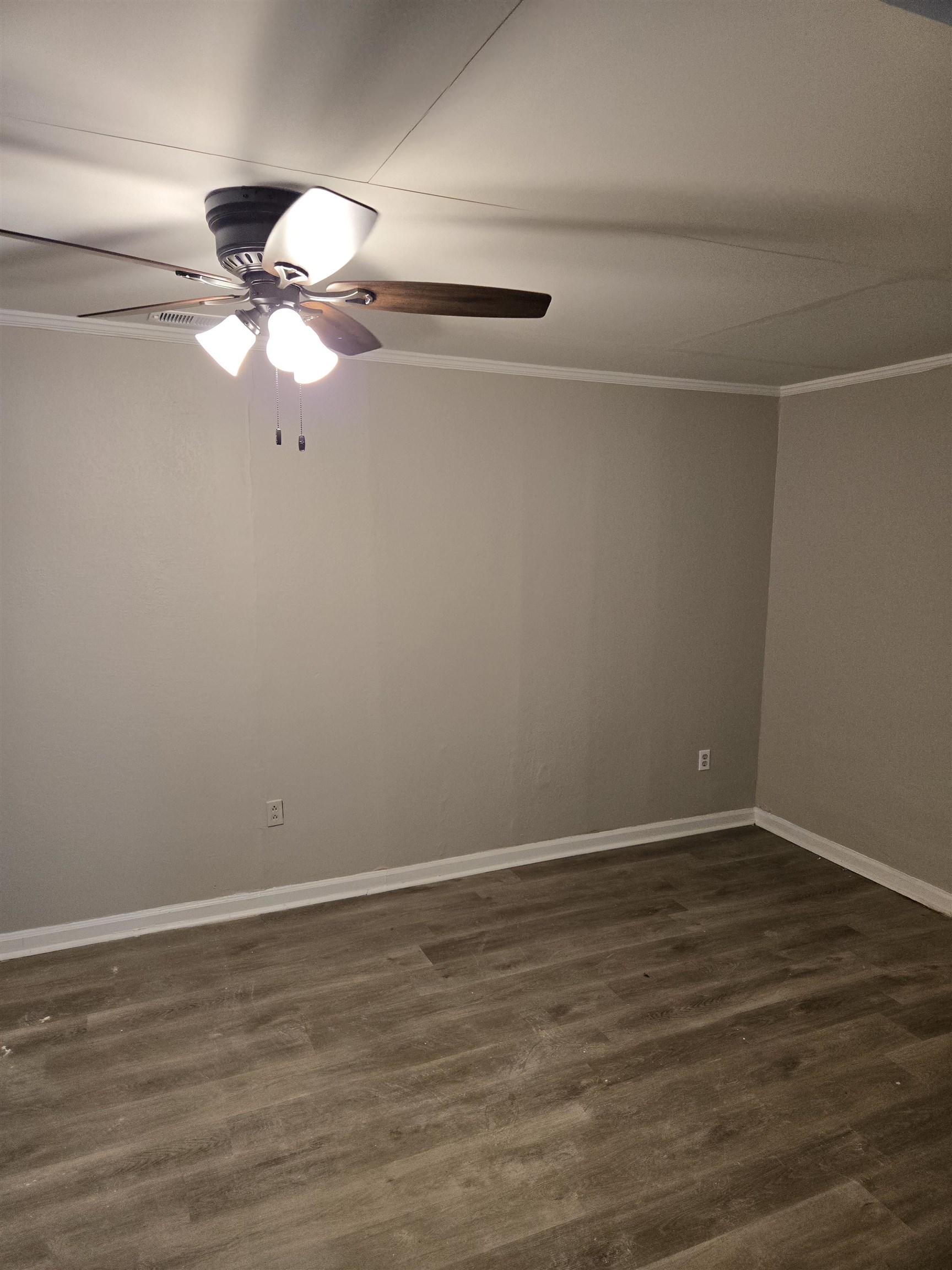 4378 Shadcrest Road Memphis, TN 38128 - Photo 5 of 5 a view of a small space with wooden floor closet and a chandelier fan