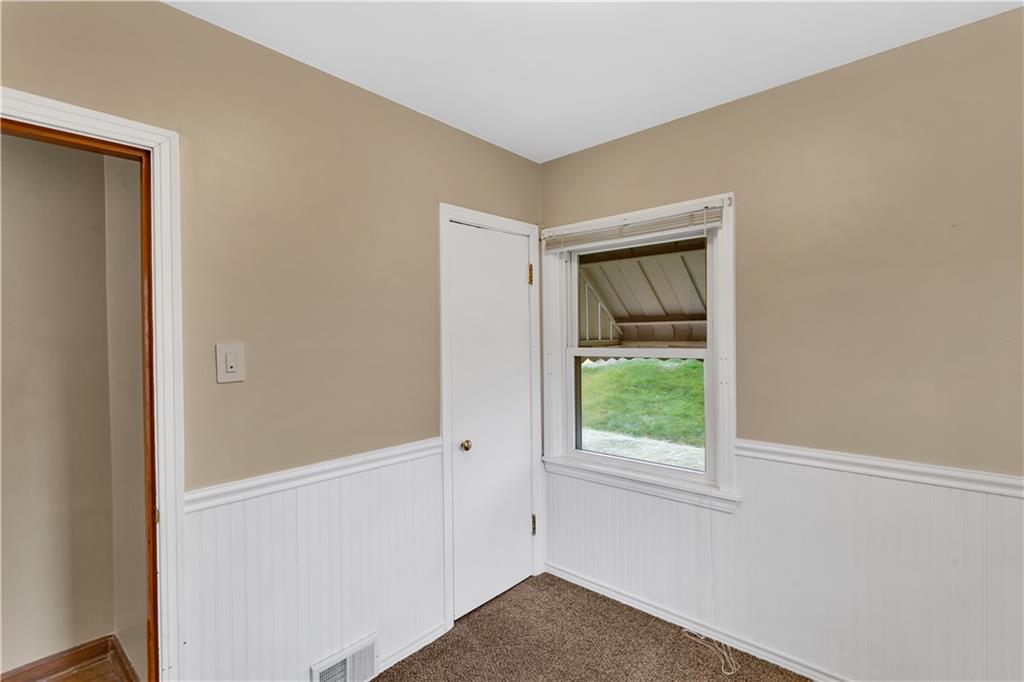 1710 Ridge Rd Extension Ambridge, PA 15003 - Photo 18 of 31 a view of an empty room with a window