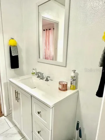 a bathroom with a toilet and shower