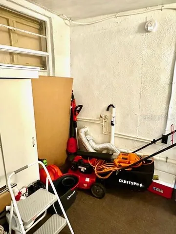 a room with table and chairs