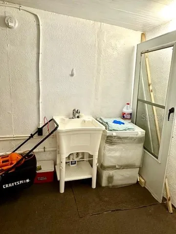 a backyard of a house with green landscape