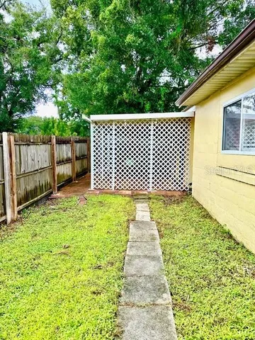 a outdoor room with chairs