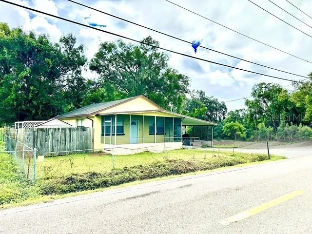 a house view with a outdoor space
