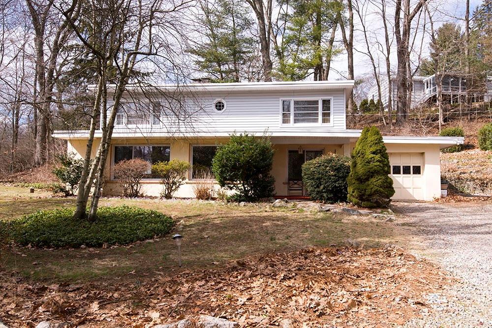 130 Old Belden Hill Road Norwalk, CT 06850 - Photo 1 of 1 a view of a house with a yard and tree s
