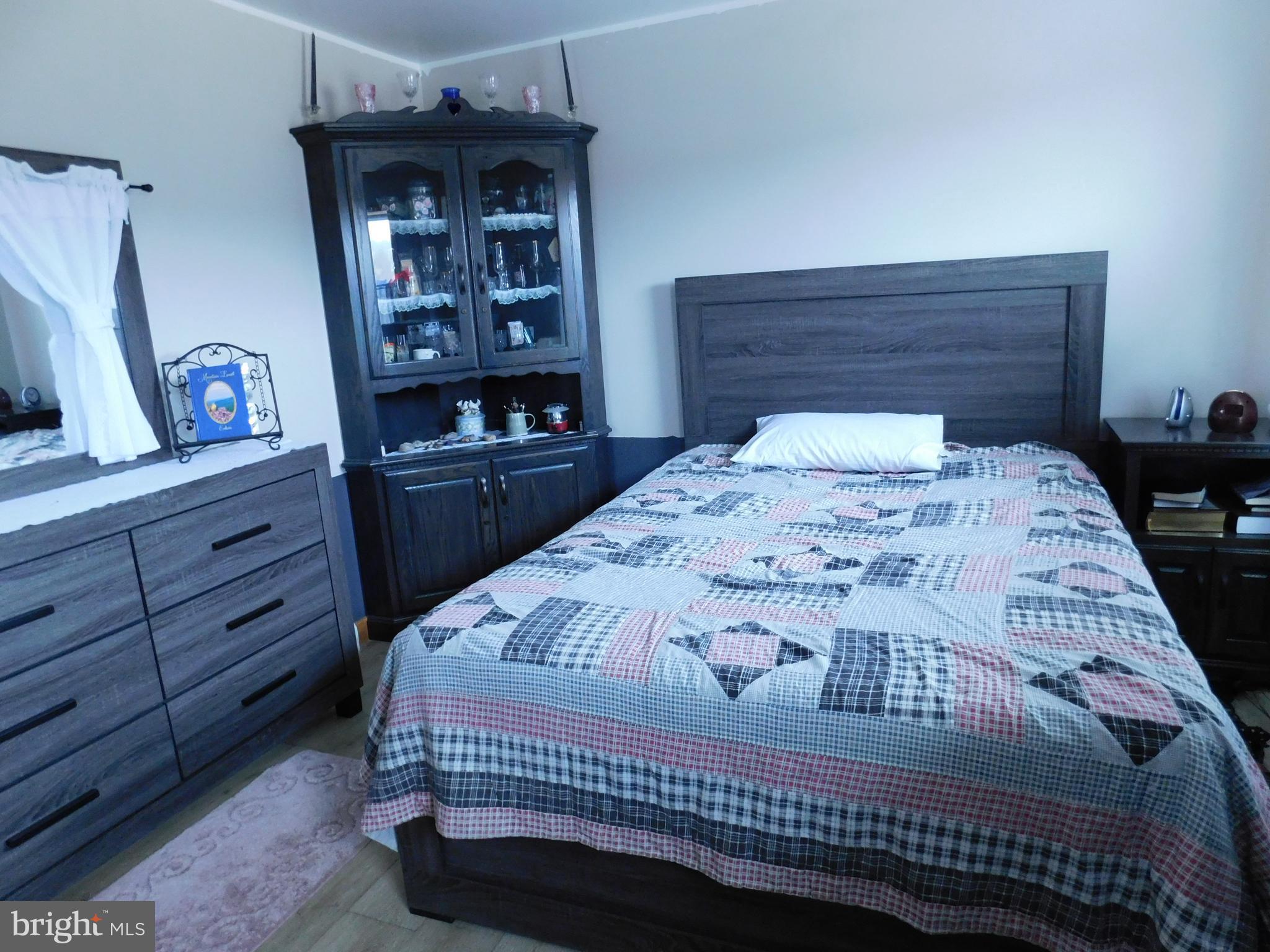 171 Gaul Road Port Royal, PA 17082 - Photo 24 of 46 a bed sitting in a bedroom and dresser