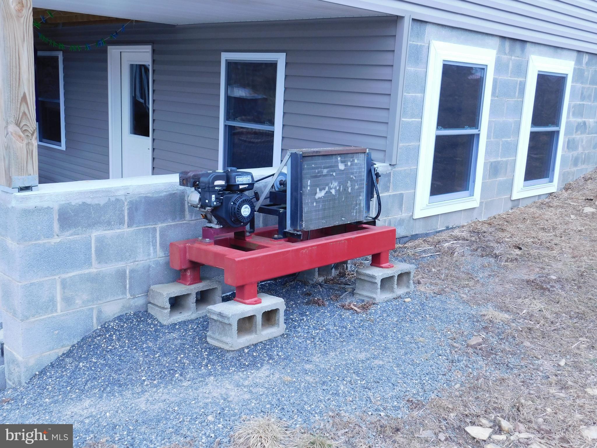 171 Gaul Road Port Royal, PA 17082 - Photo 37 of 46 a bench is sitting in front of a house