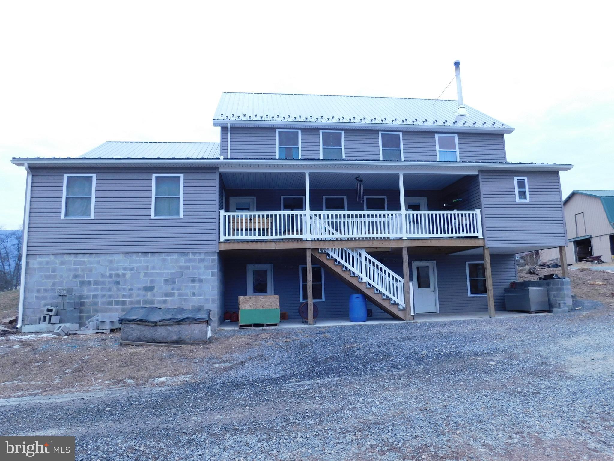 171 Gaul Road Port Royal, PA 17082 - Photo 41 of 46 a front view of a house with a porch