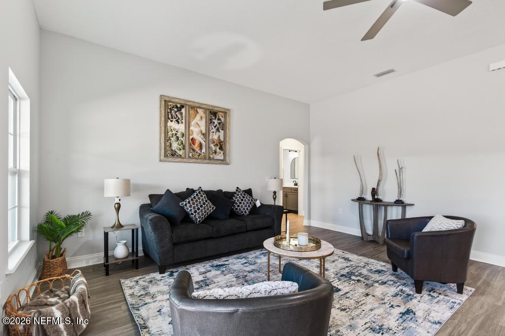 55225 Bartram Trail Callahan, FL 32011 - Photo 29 of 69 a living room with furniture and a rug