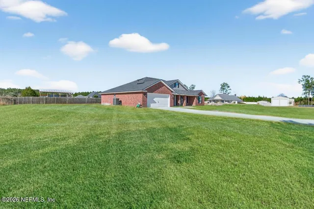 a house view with a garden space