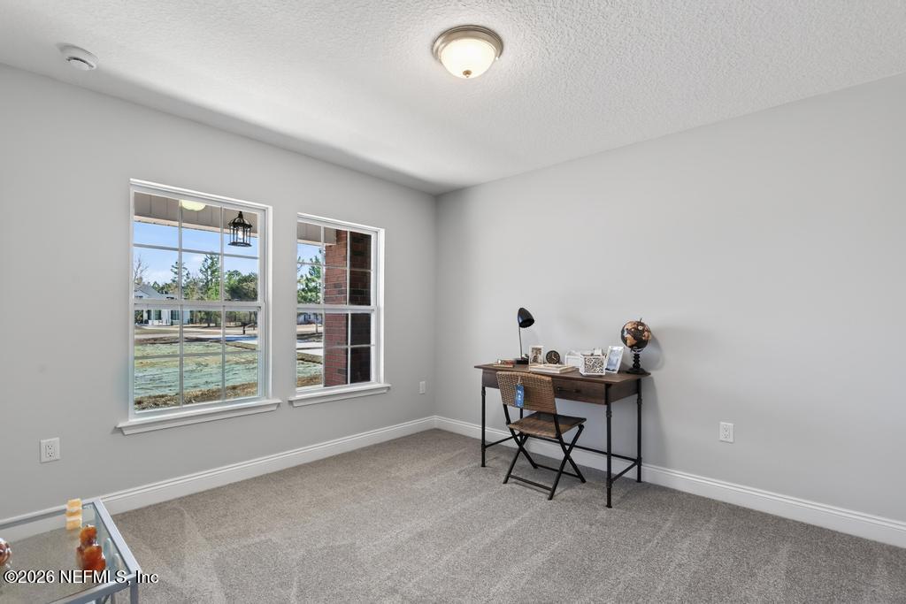 55225 Bartram Trail Callahan, FL 32011 - Photo 37 of 69 a workspace with furniture and a window