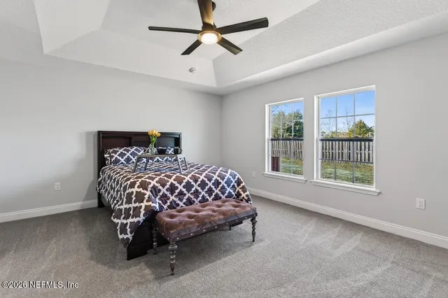 a vase of wine sitting on a table