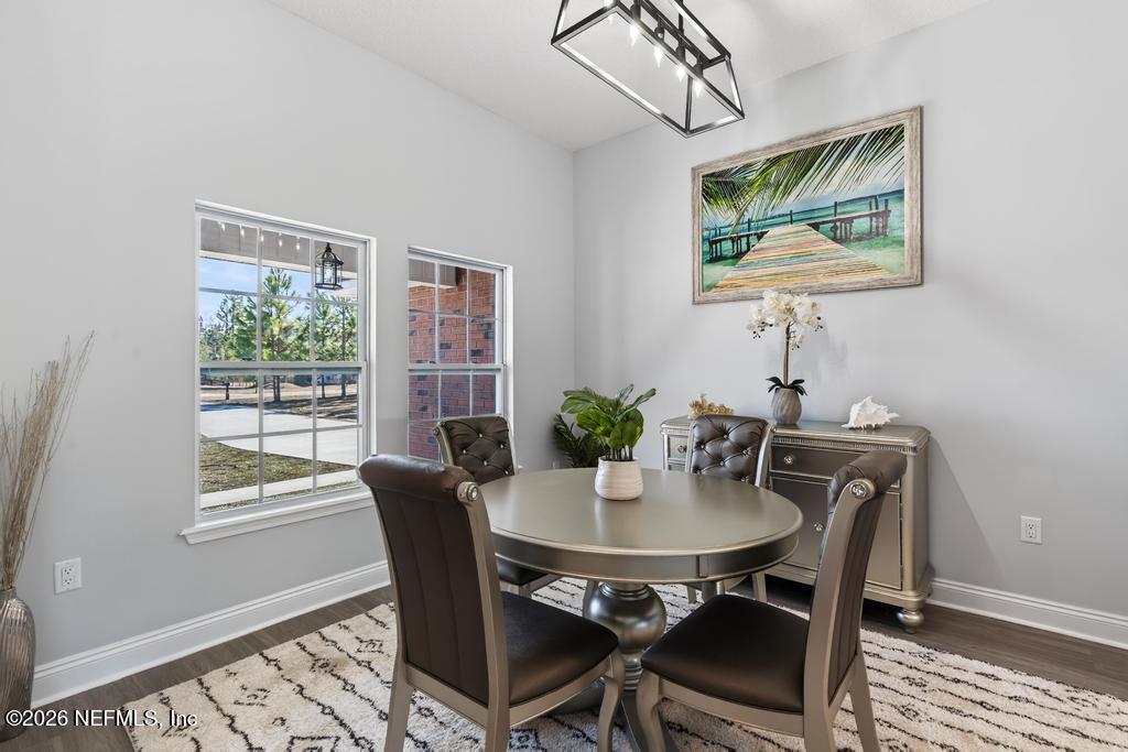 55225 Bartram Trail Callahan, FL 32011 - Photo 10 of 69 a view of a dining room with furniture window and outside view