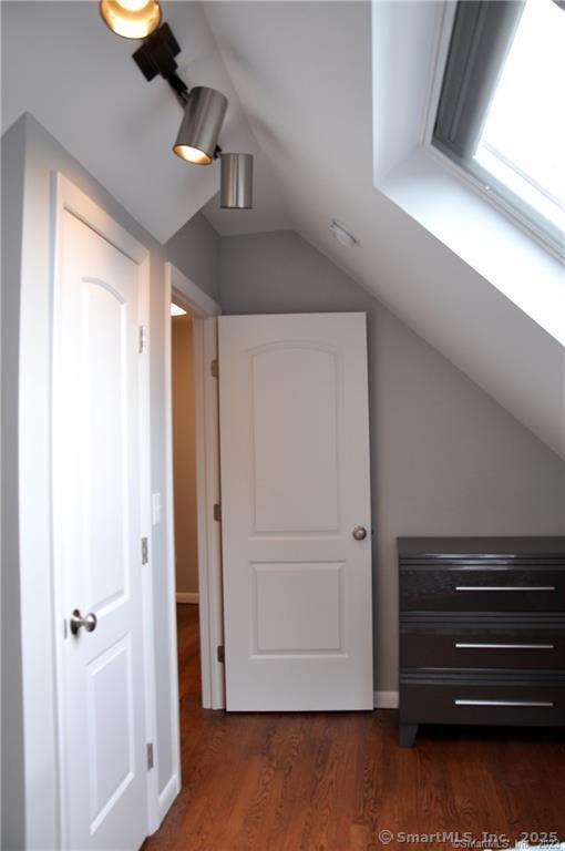 92 High Ridge Road, Unit JUNE 2026 2 Guilford, CT 06437 - Photo 27 of 33 a view of room with hardwood floor and cabinet