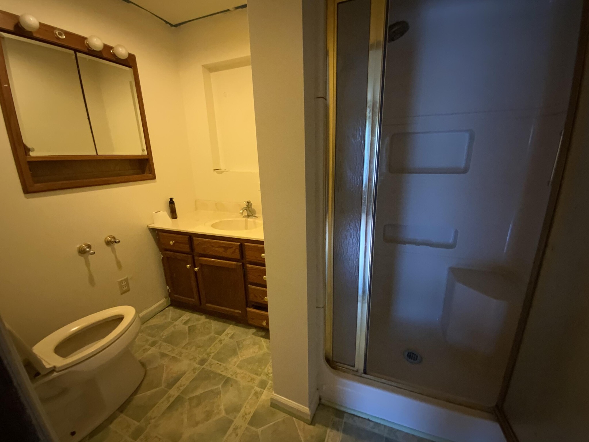 1328 Dogtown Road Ten Mile, TN 37880 - Photo 5 of 16 a bathroom with a sink and a mirror