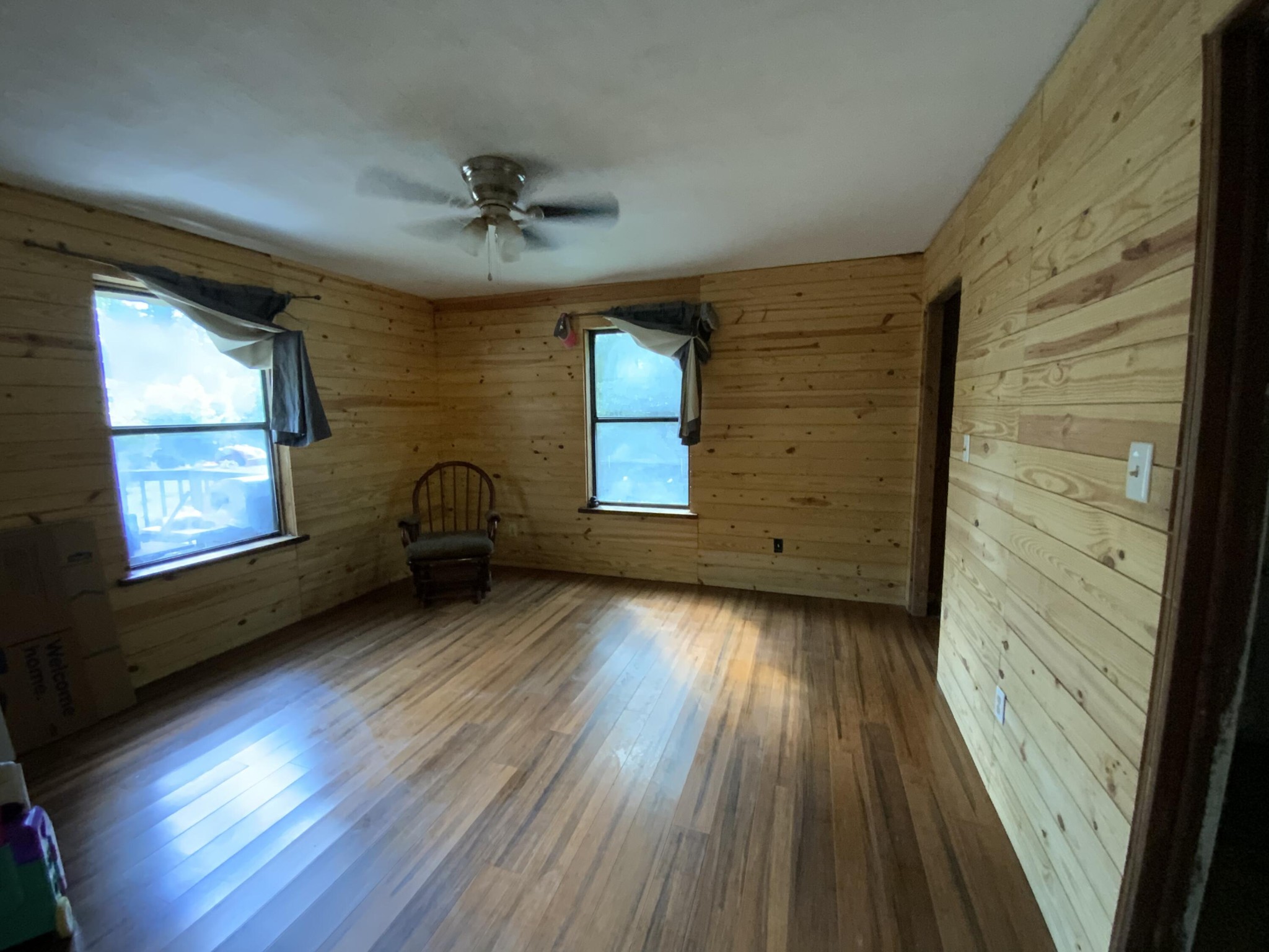 1328 Dogtown Road Ten Mile, TN 37880 - Photo 6 of 16 a view of a hallway with wooden floors and stairs