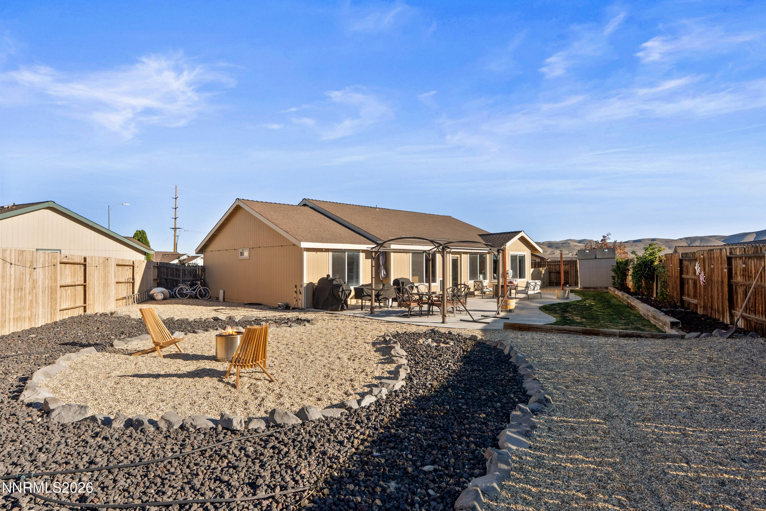 552 Spur Court Fernley, NV 89408 - Photo 42 of 46 a view of a large house with a yard