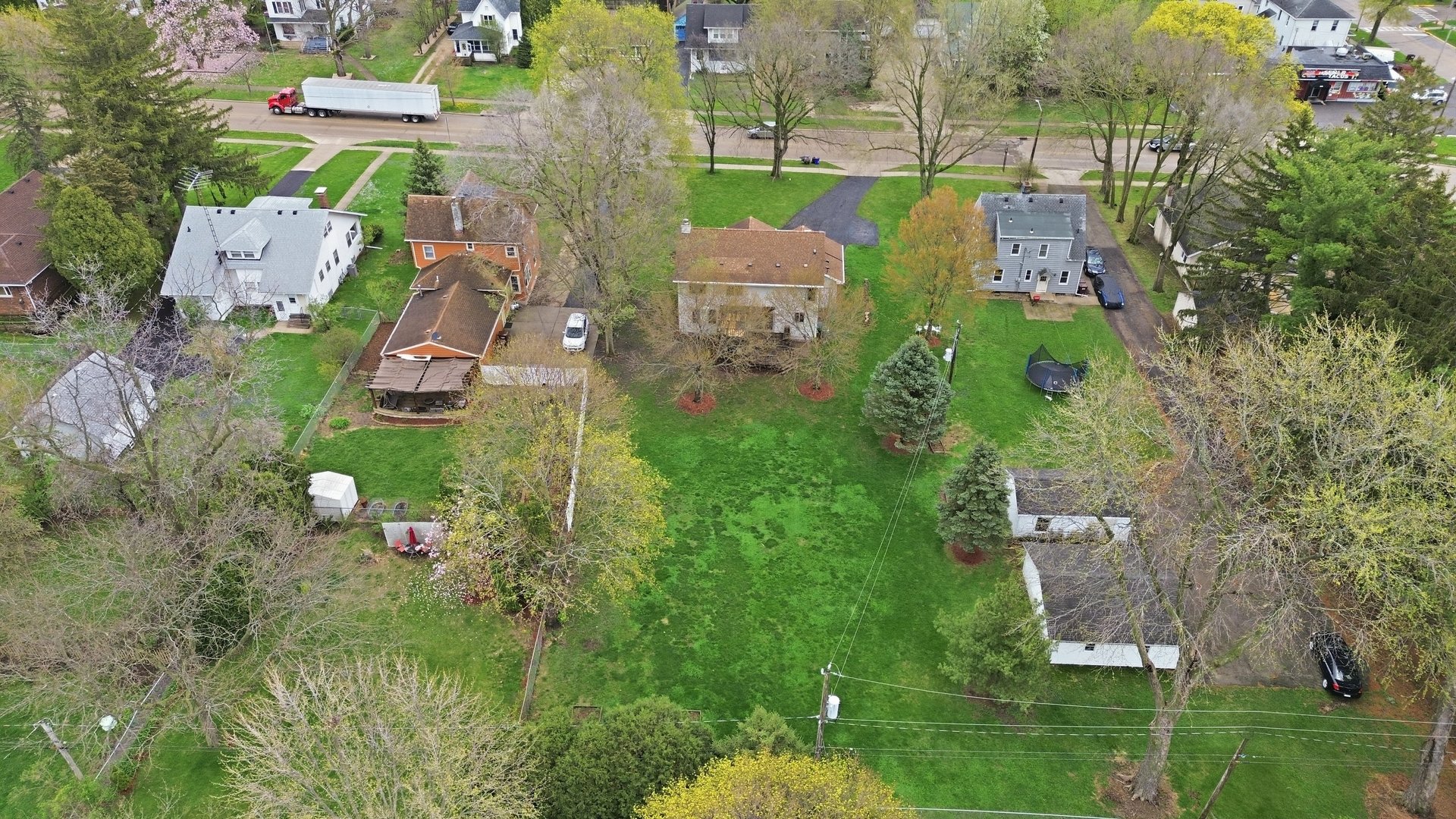 1016 North 7th Street Rochelle, IL 61068 - Photo 29 of 39 an aerial view of multiple houses with yard