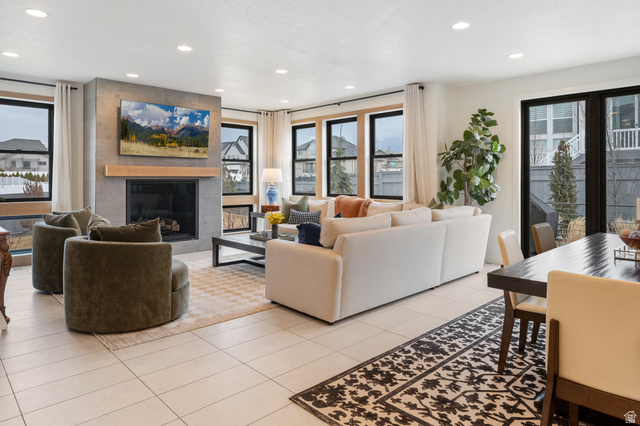 11617 South Wildrye Field Way Draper, UT 84020 - Photo 5 of 53 Living room with a fireplace, plenty of natural light, light tile patterned floors, and recessed lighting