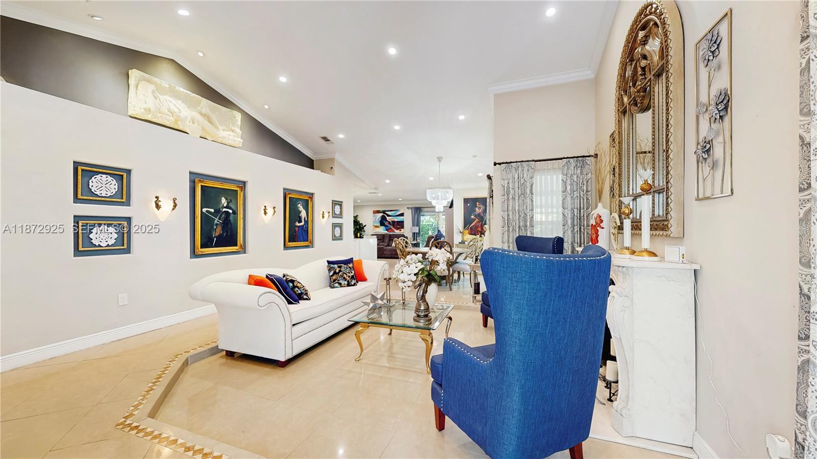 982 Northwest 133rd Court Miami, FL 33182 - Photo 6 of 22 a living room with furniture and a window