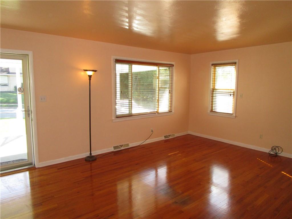 408 Indiana Avenue Farrell, PA 16121 - Photo 3 of 33 Living room with beautiful hardwood