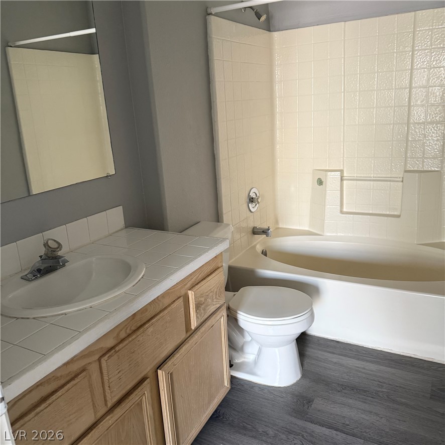 1830 North Pecos Road, Unit 258 Las Vegas, NV 89115 - Photo 13 of 14 Functional full bathroom featuring a tub and vanity with ample counter space.