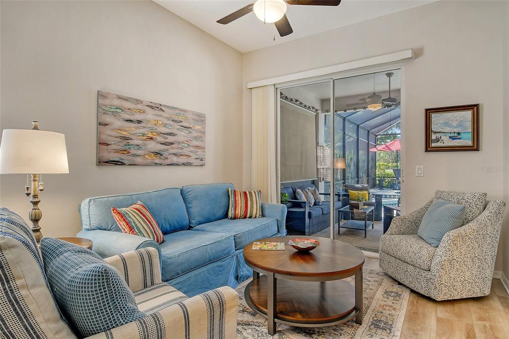 6738 Pleasant Hill Road Bradenton, FL 34203 - Photo 21 of 93 a living room with furniture and a rug