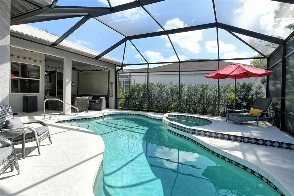 6738 Pleasant Hill Road Bradenton, FL 34203 - Photo 29 of 93 a swimming pool with patio outdoor seating and yard