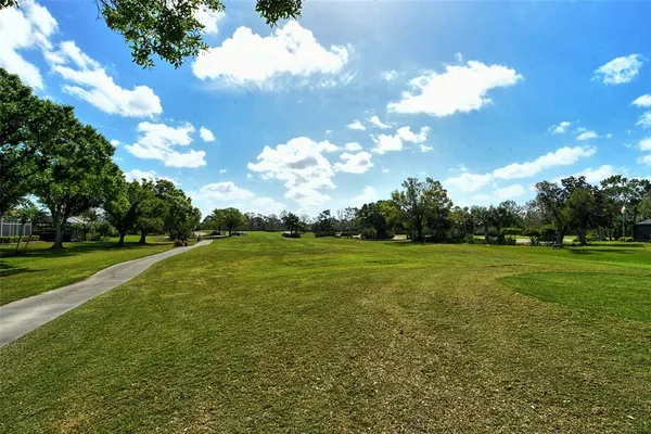 a view of a lake with a garden