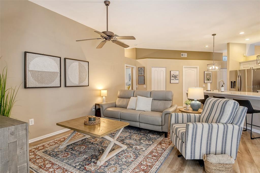 6738 Pleasant Hill Road Bradenton, FL 34203 - Photo 7 of 93 a living room with furniture and a rug