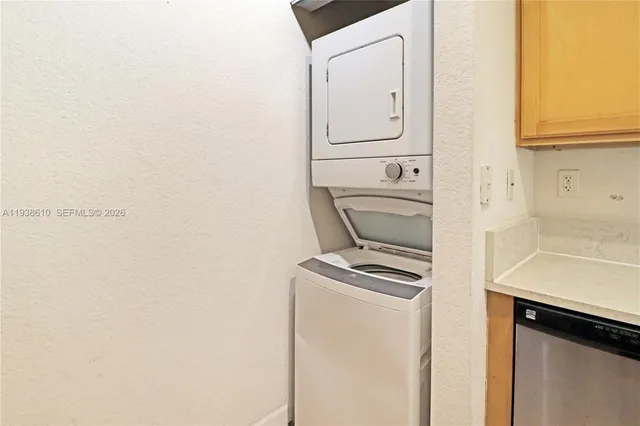 a kitchen with a stove and a microwave