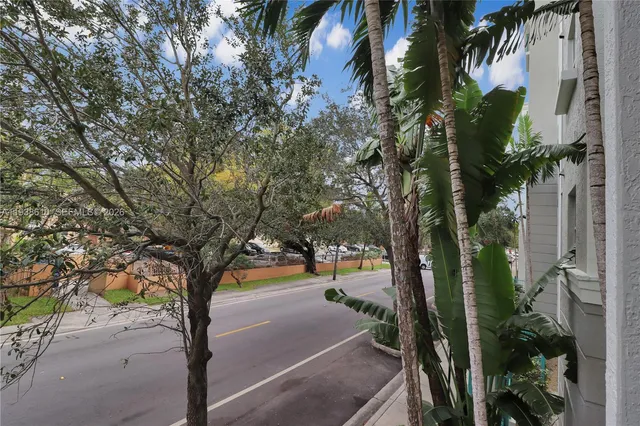 an outdoor space with lounge chairs