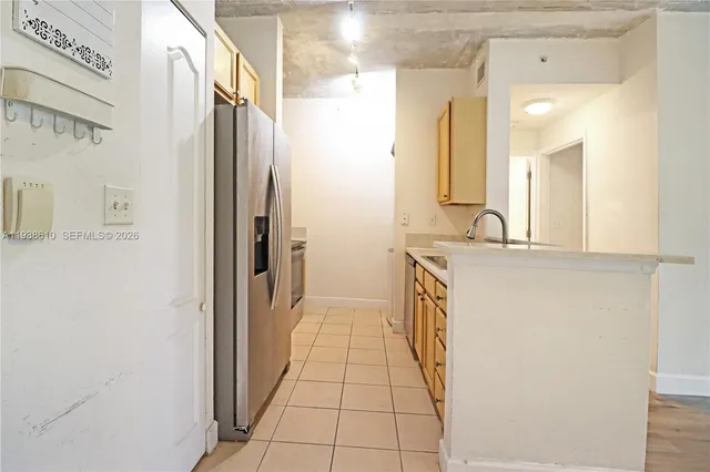 a en suite bathroom with a sink a mirror and a shower