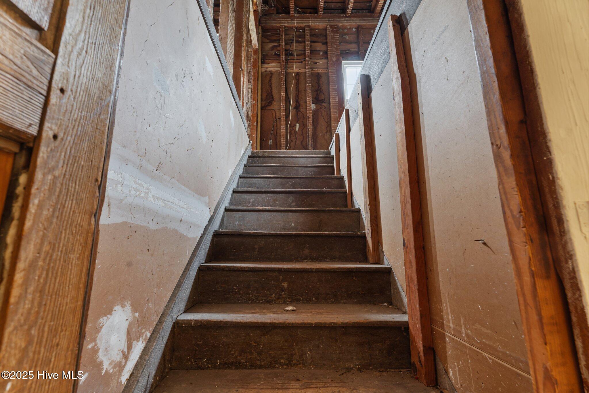 5662 Morning Star Church Road Battleboro, NC 27809 - Photo 18 of 51 Staircase to unfinished area