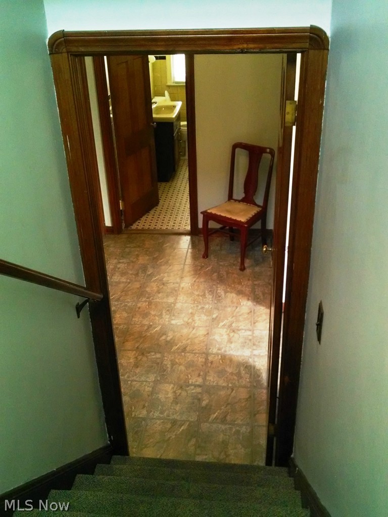 1404 South Green Road Cleveland, OH 44121 - Photo 15 of 23 Stairs to the 1st floor