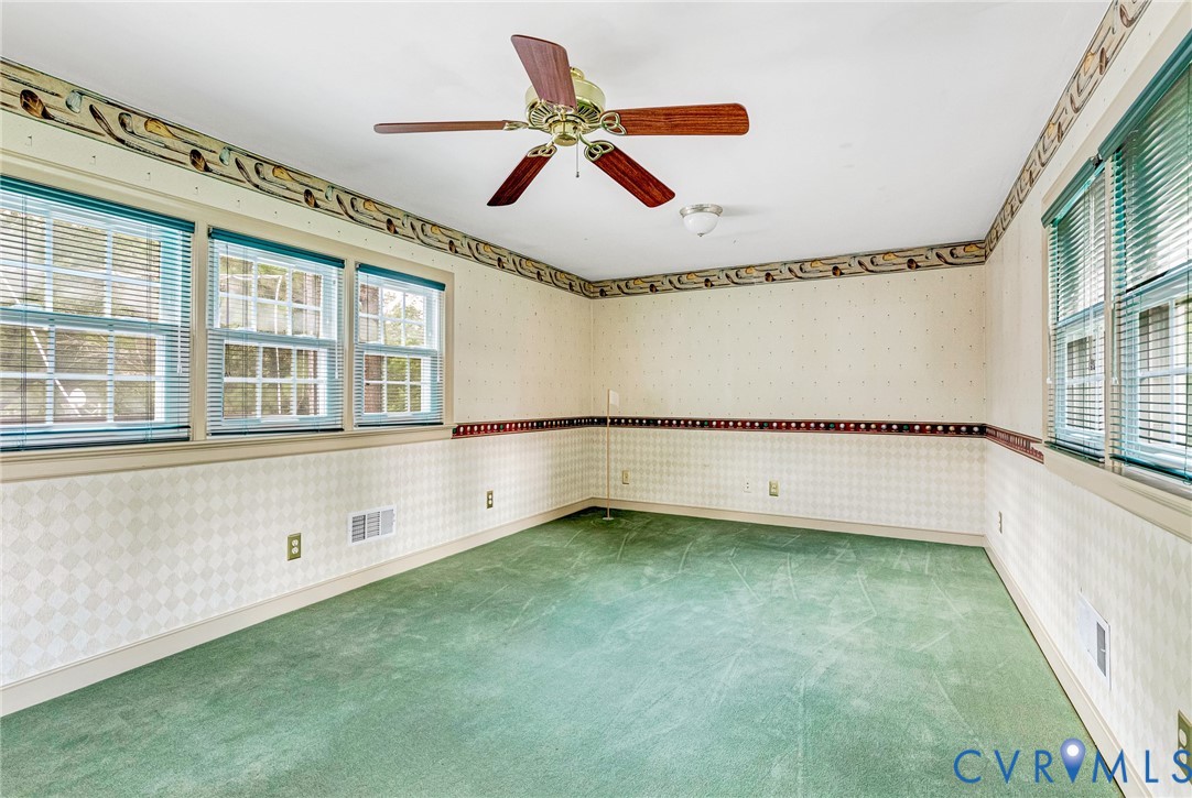 8728 Holly Hill Road Henrico, VA 23229 - Photo 16 of 36 Carpeted spare room featuring wallpapered walls an