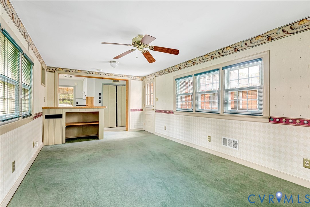 8728 Holly Hill Road Henrico, VA 23229 - Photo 17 of 36 Spare room featuring wallpapered walls, healthy am