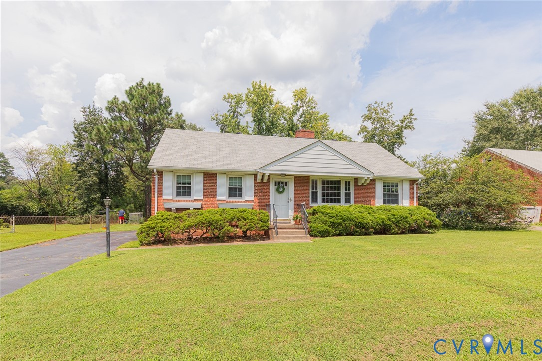 8728 Holly Hill Road Henrico, VA 23229 - Photo 2 of 36 View of front of home featuring brick siding, a ch