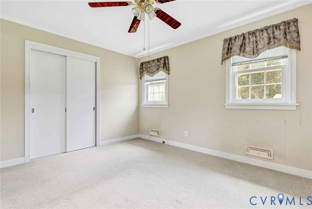 8728 Holly Hill Road Henrico, VA 23229 - Photo 21 of 36 Unfurnished bedroom featuring ornamental molding,