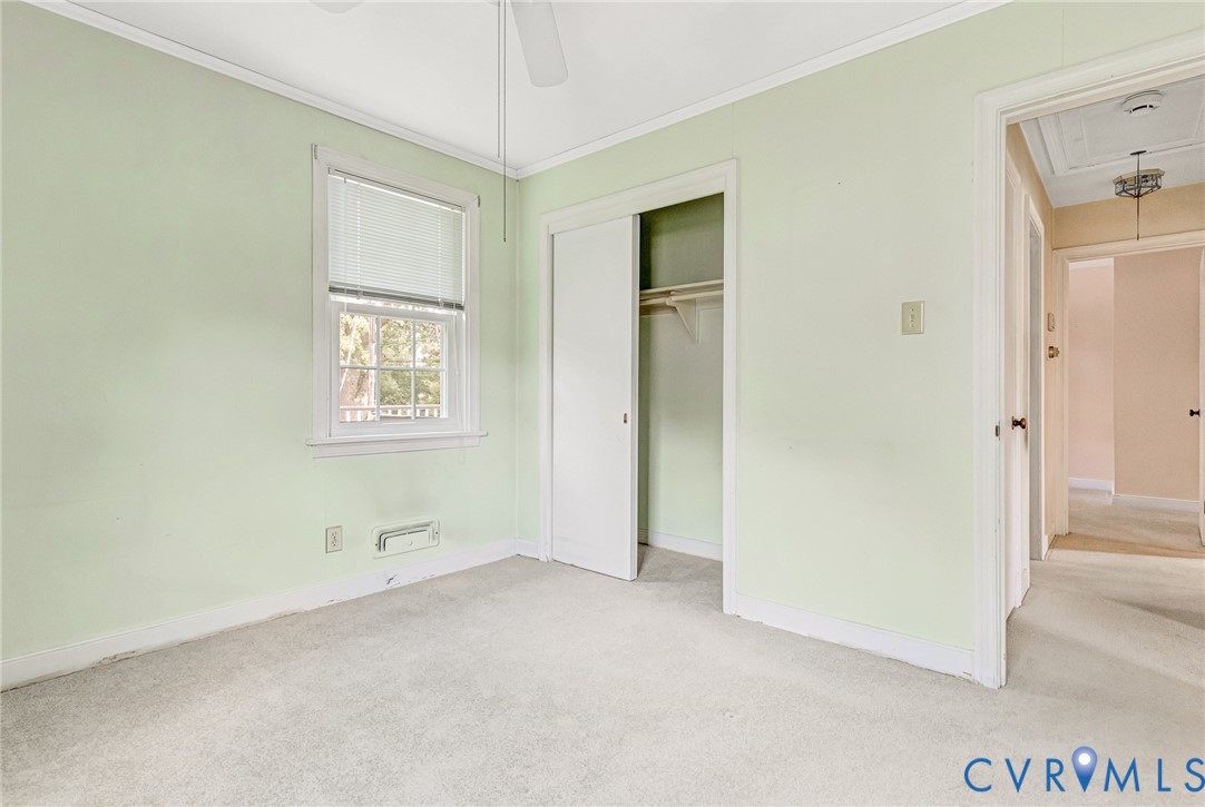 8728 Holly Hill Road Henrico, VA 23229 - Photo 24 of 36 Unfurnished bedroom featuring attic access, carpet