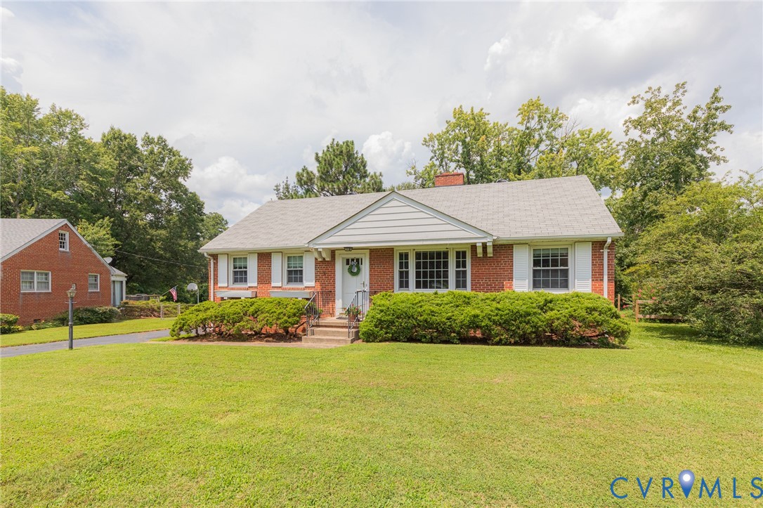 8728 Holly Hill Road Henrico, VA 23229 - Photo 34 of 36 View of front of property featuring a front lawn,
