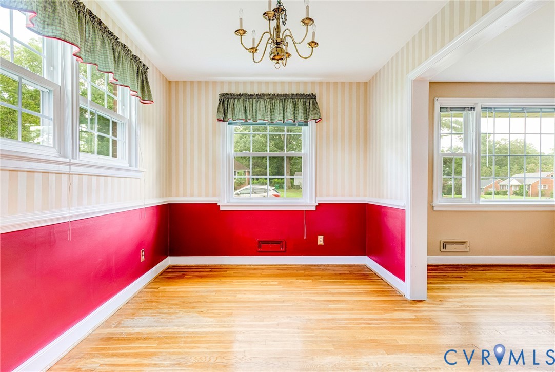 8728 Holly Hill Road Henrico, VA 23229 - Photo 8 of 36 Unfurnished dining area featuring a chandelier, wo