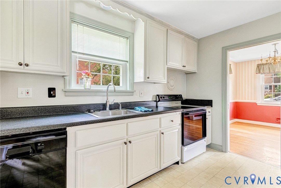 8728 Holly Hill Road Henrico, VA 23229 - Photo 10 of 36 Kitchen featuring range with electric stovetop, bl