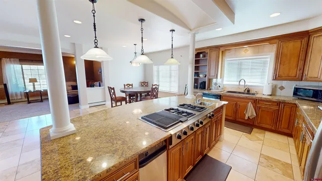 a living room with furniture and a table