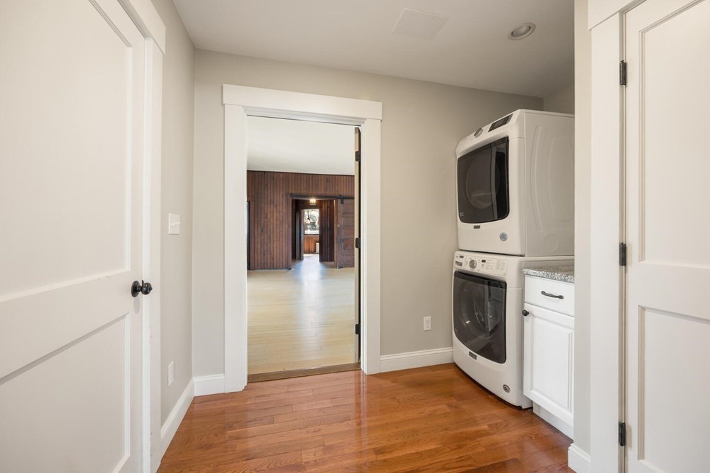 11 Stratford Road Winchester, MA 01890 - Photo 17 of 31 a view of a hallway with washer and dryer