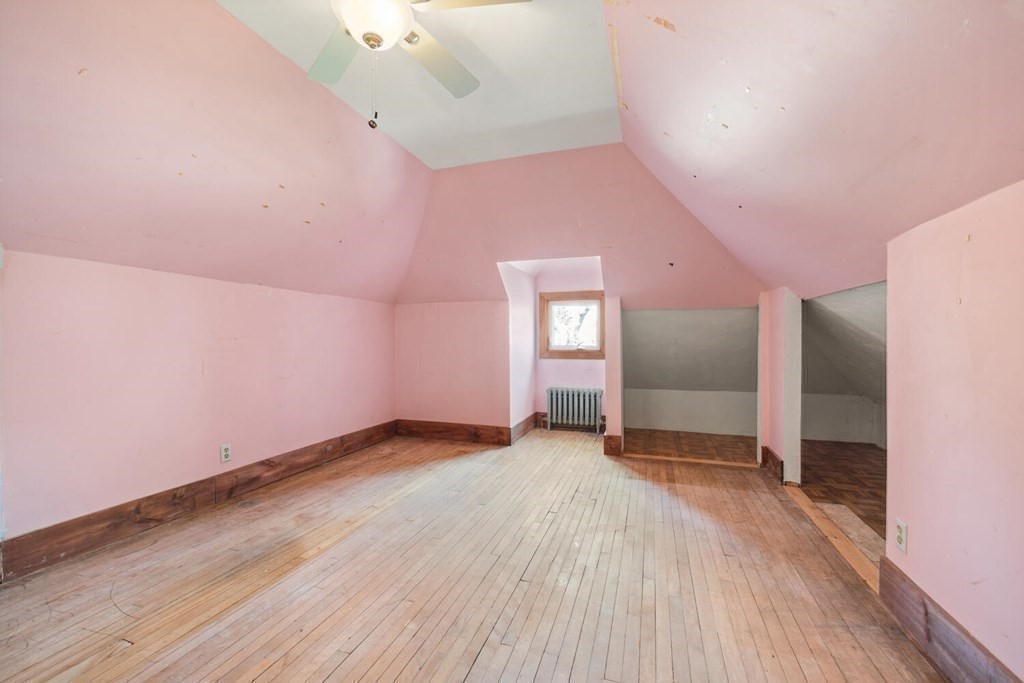 11 Stratford Road Winchester, MA 01890 - Photo 22 of 31 an empty room with wooden floor and windows