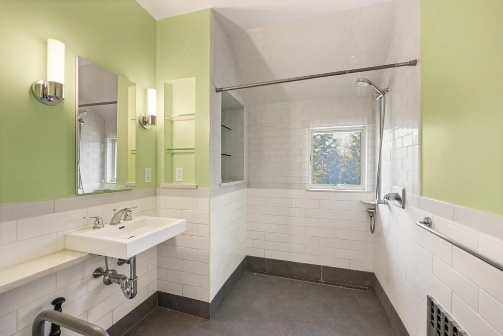 11 Stratford Road Winchester, MA 01890 - Photo 23 of 31 a bathroom with a sink and a mirror